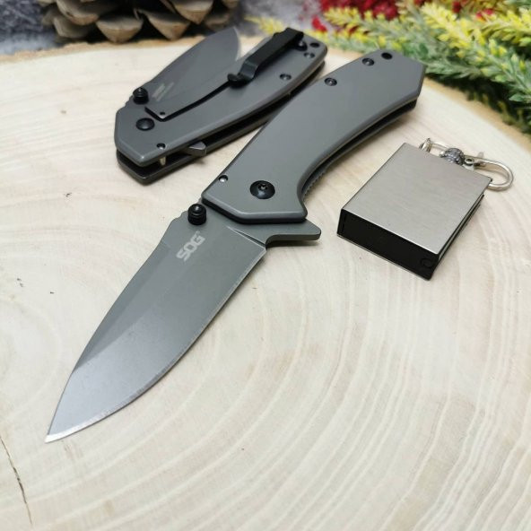 17 cm sog marka komple çelik manuel bıçak yanında zippo kibrit ile birlikte