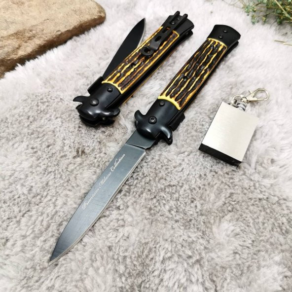 22 cm oromatik çelik bıçak yanında zippo kibrit ile birlikte