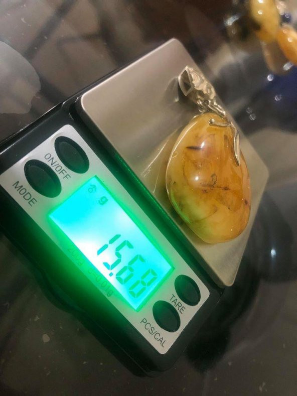 DOĞAL KAYA DAMLA KEHRİBAR KOLYE UCU OTANTİK GÜMÜŞ APARATLI 15,68 Gram