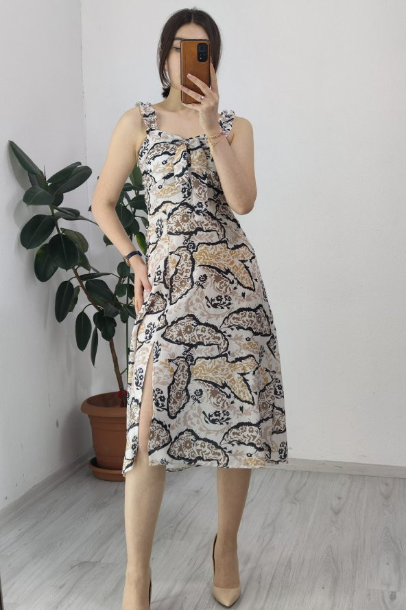 Y-50106  Y  GÖĞÜSTEN  BAĞCIKLI SOL  ÖN ETK  YIRTM ELBİSE