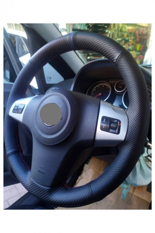 Opel Corsa Dikmeli Direksiyon Kılıfı Noktalı Alkantra Mavi Yüzüklü ürün görseli 1