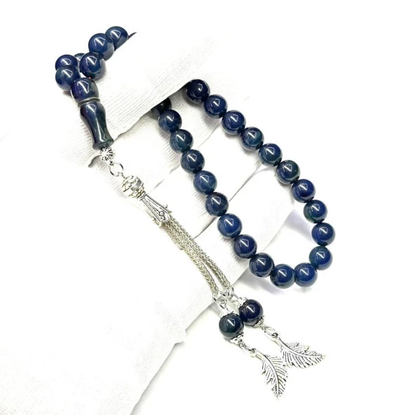 Küre Model Püsküllü 9-9mm Hareli Sıkma Kehribar Tesbih ürün görseli