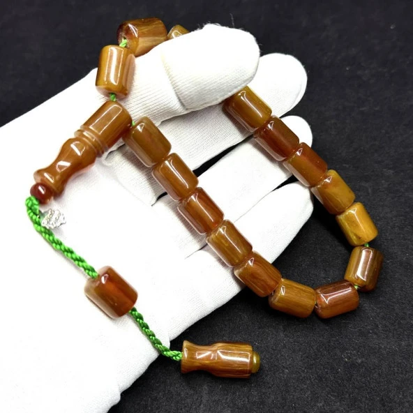 Şükrü Baba Usta İmzalı Çubuk Malzeme Bilek Boy Maskot Kesme Model Sistemli 11-14mm Hareli Sıkma Kehribar Tesbih ürün görseli