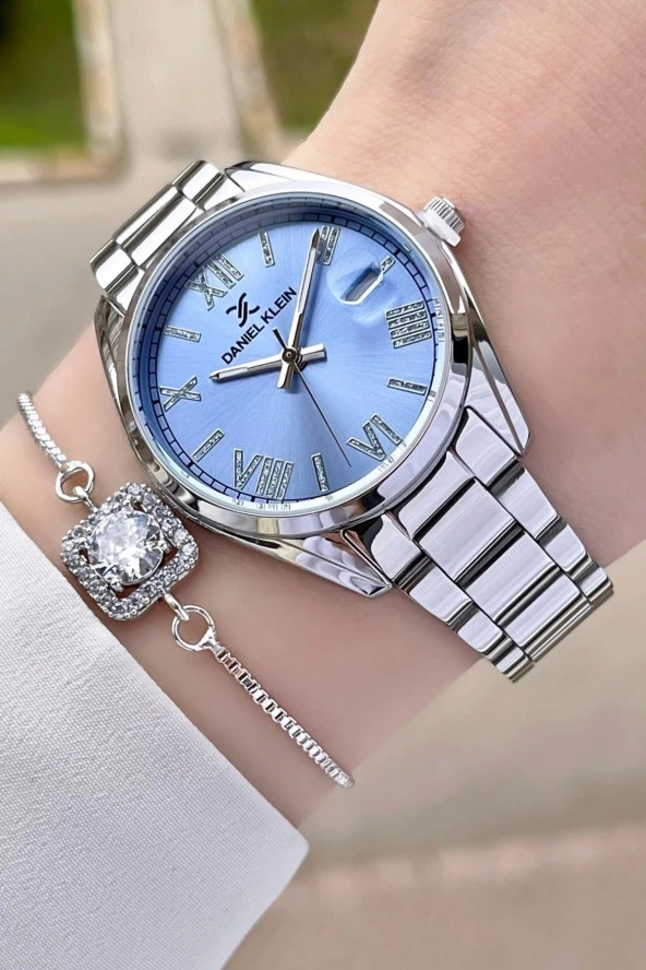 Daniel Klein DKISTE970 Kadranı Mavi Kordonu Gümüş Renk Takvimli Kadın Kol Saati ve Bileklik