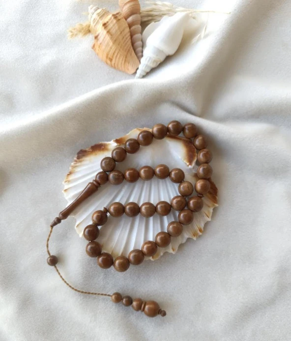 Tesbih 33 lük 10 mm Küre Kesim Hakiki Kuka Ağacı Çektikce Siyahlaşan Tespih