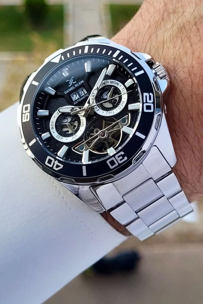 Daniel Klein DKISTE1261 Kadranı Siyah Kordonu Gümüş Renk Otomatik Takvimli Hediye Paketli Erkek Kol Saati ürün görseli 1