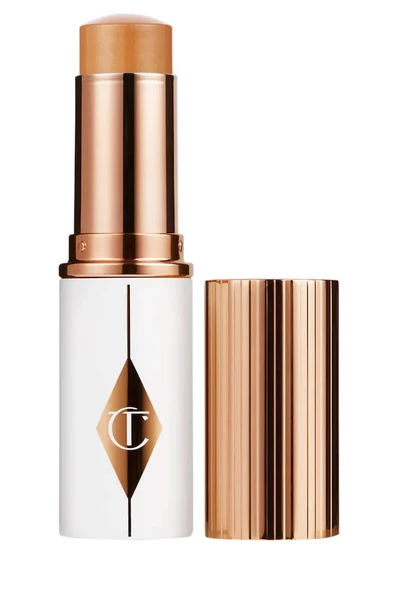 Charlotte Tilbury Unreal Skin Sheer Glow Tint 9 Tan - Nemlendirici Stick fondöten 8 ml